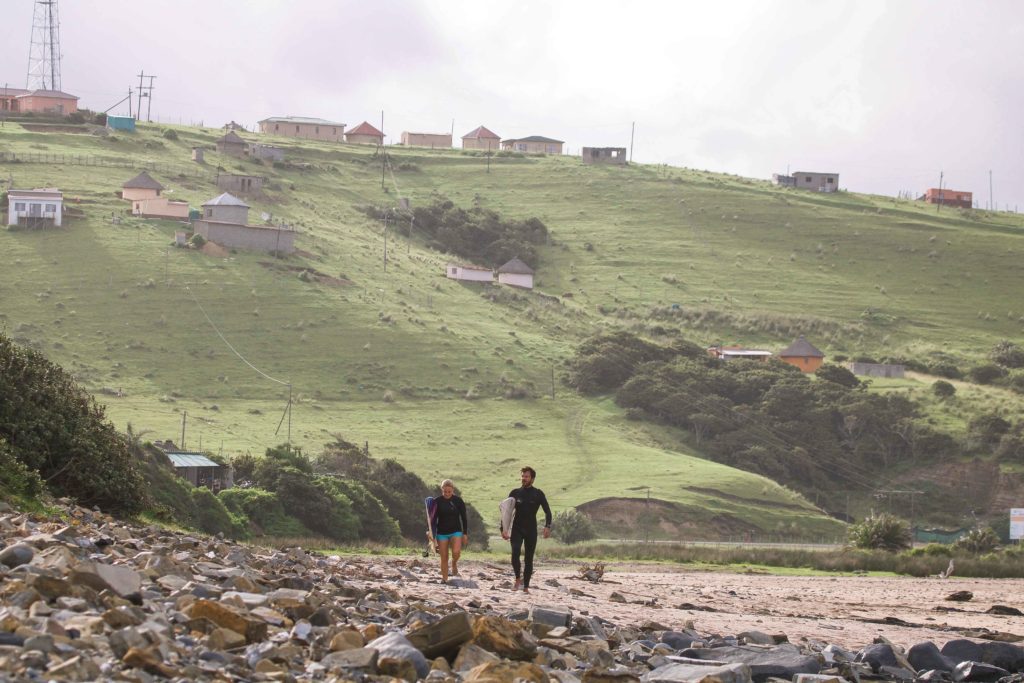 walking up the point with the local village in coffee bay